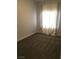 Carpeted bedroom with sheer curtains and bright natural light at 6450 Spring Jog St, Las Vegas, NV 89166