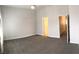Spacious bedroom with neutral carpet, and a ceiling fan offers a comfortable and inviting atmosphere at 6450 Spring Jog St, Las Vegas, NV 89166