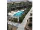 Community pool area offering a serene view of the surrounding neighborhood at 6450 Spring Jog St, Las Vegas, NV 89166