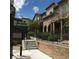 Stylish townhomes with stone accents, private balconies, and well-maintained landscaping at 6450 Spring Jog St, Las Vegas, NV 89166