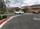 Convenient parking area with neatly arranged spaces surrounded by landscaped greenery at 6450 Spring Jog St, Las Vegas, NV 89166