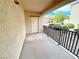 Balcony with black metal railing and view of complex at 6635 Flaminian Ln # 104, North Las Vegas, NV 89084