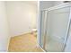 Bathroom with tile floor, shower and toilet at 6635 Flaminian Ln # 104, North Las Vegas, NV 89084