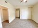 Neutral bedroom with walk-in closet and carpeted floors at 6635 Flaminian Ln # 104, North Las Vegas, NV 89084