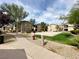 Well-maintained apartment community grounds with walking path, grass, and tidy landscaping at 6635 Flaminian Ln # 104, North Las Vegas, NV 89084