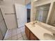 Bathroom featuring double sink vanity, walk in shower and neutral design at 6908 Dorita Ave # 101, Las Vegas, NV 89108