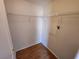 Walk-in closet featuring wire shelving, and laminate floors at 6908 Dorita Ave # 101, Las Vegas, NV 89108