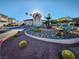 Beautiful clubhouse featuring desert landscaping, mature palm trees, and well-maintained grounds in a desirable location at 6908 Dorita Ave # 101, Las Vegas, NV 89108