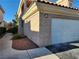 Two-car garage with an automatic door at 6908 Dorita Ave # 101, Las Vegas, NV 89108