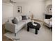 Bright living room with neutral tones, modern decor, and a cozy seating arrangement, creating a welcoming space at 6908 Dorita Ave # 101, Las Vegas, NV 89108