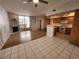 Open-concept floorplan featuring a fireplace and kitchen at 6908 Dorita Ave # 101, Las Vegas, NV 89108