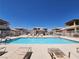 Enjoy a refreshing swim in this sparkling blue community pool on a sunny day at 6908 Dorita Ave # 101, Las Vegas, NV 89108