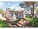 The backyard features a tiled roof and multiple windows for natural light at 7617 Sea Cliff Way, Las Vegas, NV 89128