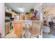 Open kitchen area with a breakfast bar overlooking the living area at 7617 Sea Cliff Way, Las Vegas, NV 89128