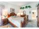 Spacious main bedroom features large furniture, carpet and bright lighting at 7617 Sea Cliff Way, Las Vegas, NV 89128