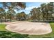 Recreational sand volleyball court area under trees and shade in the community at 7617 Sea Cliff Way, Las Vegas, NV 89128