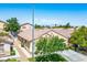 Aerial view of a single story home with a tile roof and mature landscaping at 7755 Pacific Rim Ct, Las Vegas, NV 89139