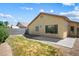 Fenced backyard with a small patio and minimal desert landscaping at 7755 Pacific Rim Ct, Las Vegas, NV 89139