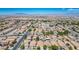 Expansive view showcases a vibrant neighborhood with diverse homes, mature trees, and mountain views at 7755 Pacific Rim Ct, Las Vegas, NV 89139