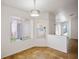 Dining area featuring tile flooring, natural light, and modern light fixture at 7755 Pacific Rim Ct, Las Vegas, NV 89139