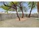 This backyard showcases desert landscaping, mature trees, and brick patio at 7949 Long Beach St, Las Vegas, NV 89139