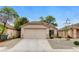 Charming single-story home with a two-car garage and desert landscaping at 7949 Long Beach St, Las Vegas, NV 89139