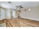 Open concept living room with new floors, recessed lighting, and arched design elements at 7949 Long Beach St, Las Vegas, NV 89139