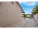 A cozy backyard features an outside building, a concrete patio area, and a block fence at 8024 Hackberry Dr, Las Vegas, NV 89123
