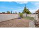 Backyard featuring desert landscaping, a storage shed, and block fence at 8024 Hackberry Dr, Las Vegas, NV 89123