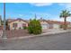 Charming single-story home featuring a well-maintained lawn and a two-car garage at 8024 Hackberry Dr, Las Vegas, NV 89123