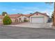 Charming single-story home featuring a well-maintained lawn and a two-car garage at 8024 Hackberry Dr, Las Vegas, NV 89123