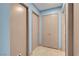 Hallway featuring paneled doors and neutral walls at 8024 Hackberry Dr, Las Vegas, NV 89123