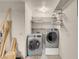 View of laundry room with modern washer and dryer at 8024 Hackberry Dr, Las Vegas, NV 89123