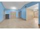 Open living area with tile floors, storage, and ample space at 8024 Hackberry Dr, Las Vegas, NV 89123