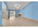 Bright living room with a cozy fireplace and tile flooring at 8024 Hackberry Dr, Las Vegas, NV 89123