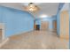 Spacious living area with tile floors, fireplace, and abundant natural light at 8024 Hackberry Dr, Las Vegas, NV 89123