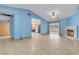 Spacious living room with tile flooring, fireplace, and seamless open floor plan at 8024 Hackberry Dr, Las Vegas, NV 89123