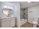 Updated bathroom with a modern vanity, sleek fixtures, and a tiled shower and tub at 8101 W Flamingo Rd # 1035, Las Vegas, NV 89147