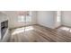 Bright living room featuring hardwood floors, natural light, and views of the community at 8101 W Flamingo Rd # 1035, Las Vegas, NV 89147