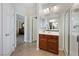 Bathroom featuring a double mirror and a glass walk-in shower at 820 Colina Alta Pl, Las Vegas, NV 89138