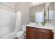 Cozy bathroom featuring a shower-tub combination, single sink vanity, and neutral wall paint at 820 Colina Alta Pl, Las Vegas, NV 89138