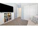 Bedroom features a comfortable couch, large tv, and plenty of storage at 820 Colina Alta Pl, Las Vegas, NV 89138