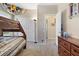 View of bedroom with wooden bunk bed, neutral walls, carpet and storage options at 820 Colina Alta Pl, Las Vegas, NV 89138