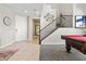 Spacious entryway with a staircase, tile flooring, and neutral paint at 820 Colina Alta Pl, Las Vegas, NV 89138