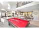 Spacious living room with a pool table and comfortable seating at 820 Colina Alta Pl, Las Vegas, NV 89138