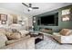 Comfortable living room showcases a built-in fireplace and media center, perfect for relaxation and entertainment at 820 Colina Alta Pl, Las Vegas, NV 89138