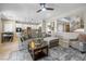 Open-concept living space with seamless transition to kitchen and second story staircase, great for entertaining at 820 Colina Alta Pl, Las Vegas, NV 89138