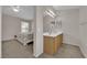 Primary bathroom featuring a double sink vanity and bedroom with window at 8873 Happy Stream Ave, Las Vegas, NV 89143