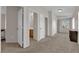 Spacious bedroom with neutral walls, carpeted floor, and closet doors at 8873 Happy Stream Ave, Las Vegas, NV 89143