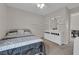 Comfortable bedroom with carpet, neutral walls and modern white dresser at 8873 Happy Stream Ave, Las Vegas, NV 89143